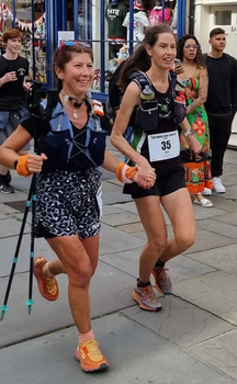 This photo is of Rachel Piper alongside Helen Knight of CLC Striders